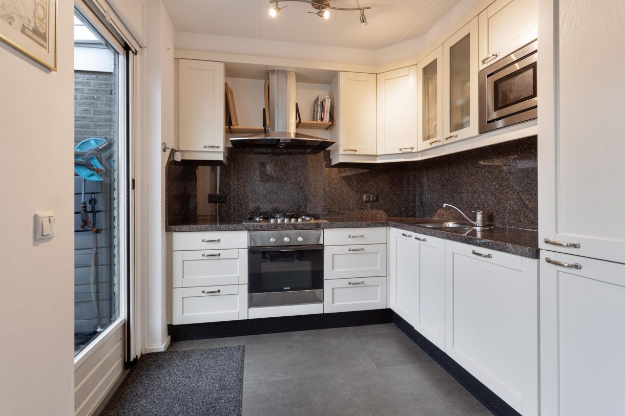 Te koop: Foto Woonhuis aan de Dr. Abraham Kuyperlaan 18 in Veghel